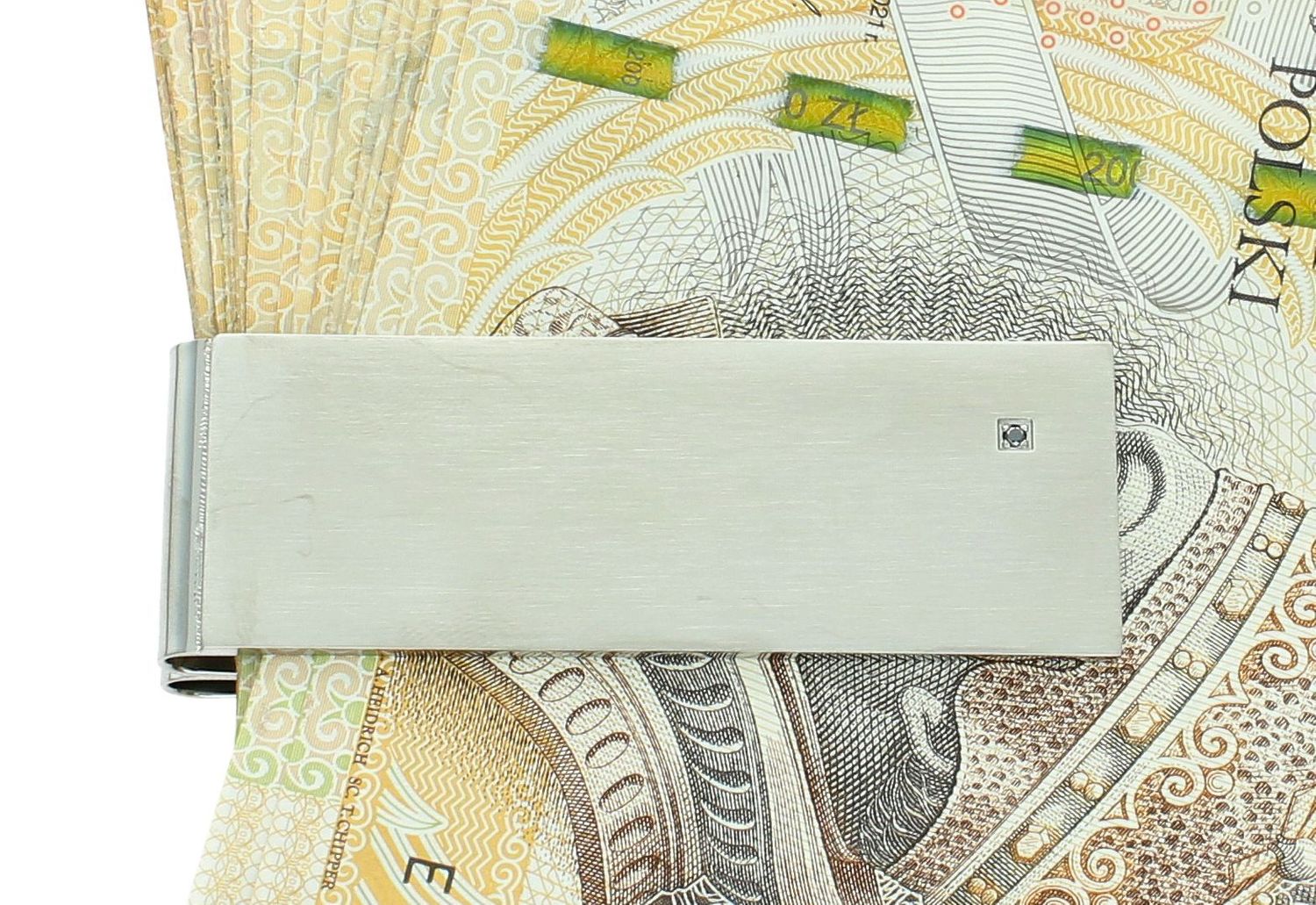 Klips do banknotów Nomination z Diamentem 028310 009. Oryginalny klips do banknotów wykonany ze stali szlachetnej pokryty metodą PVD w kolorze srebrnym. Elegancji dodaje czarny diament na najbardziej widocznym miejscu.webp